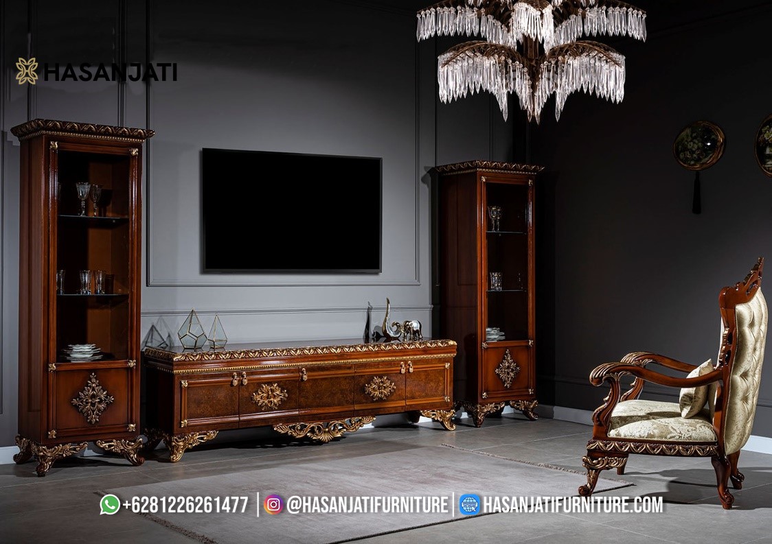 Bufet TV klasik mewah warna cokelat kombinasi gold dengan ukiran megah dan kaki artistik khas Jepara dari Hasan Jati Furniture.