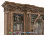 Detail piringan profil kayu mahkota atas dan bagian bingkai kaca oval 2 pintu tengah lemari buku jati klasik Renaissance jepara.