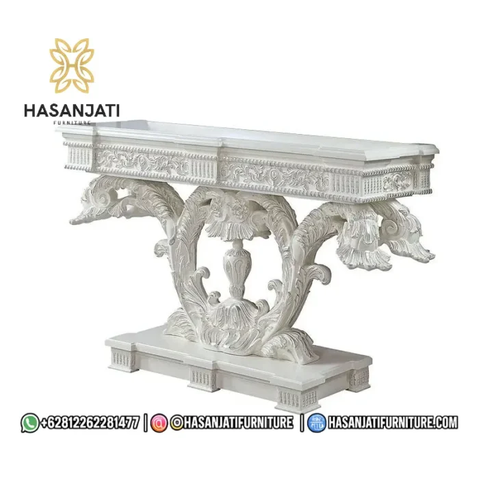 Detail pahatan tangan ornamen scrollwork warna silver metalik dan gold highlights pada kolong tengah meja konsol mewah Kallista