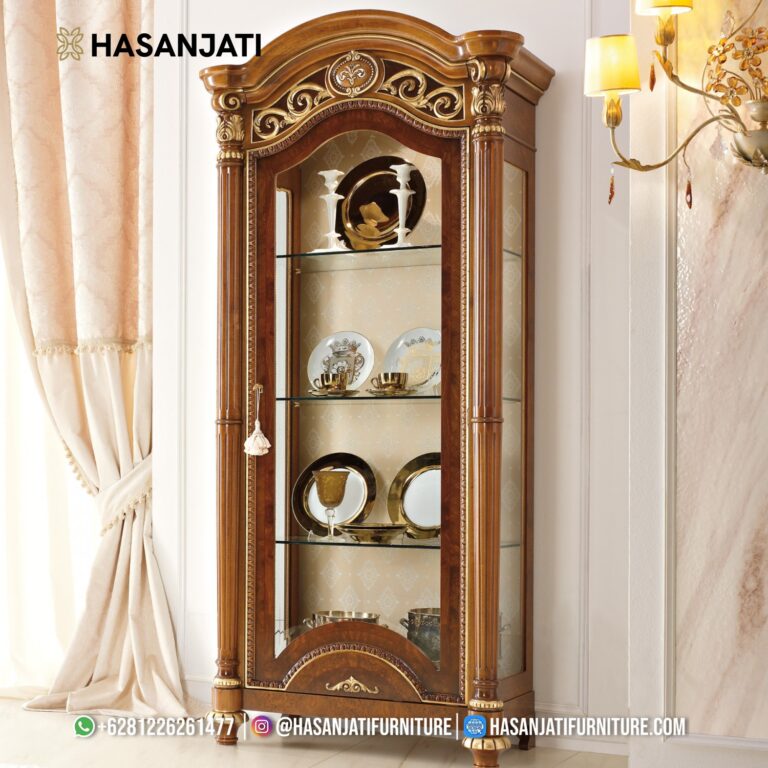 Lemari hias ramping seri Luigi warna cokelat emas tipe 1 pintu kaca produk Hasan Jati Furniture.