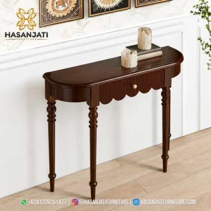 Penempatan meja foyer kayu jati seri klasik dengan aksen hias jam meja logam mewah tampak atas.