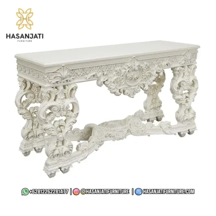 Tampilan sudut serong samping meja konsol mewah seri Novella white gloss memperlihatkan detail ukiran kaki corbel yang tebal dan masif