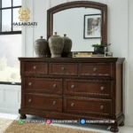 Meja kredenza pakaian 7 laci klasik dengan bingkai cermin lengkung besar seri Porter warna burnished brown produk Hasan Jati Furniture.