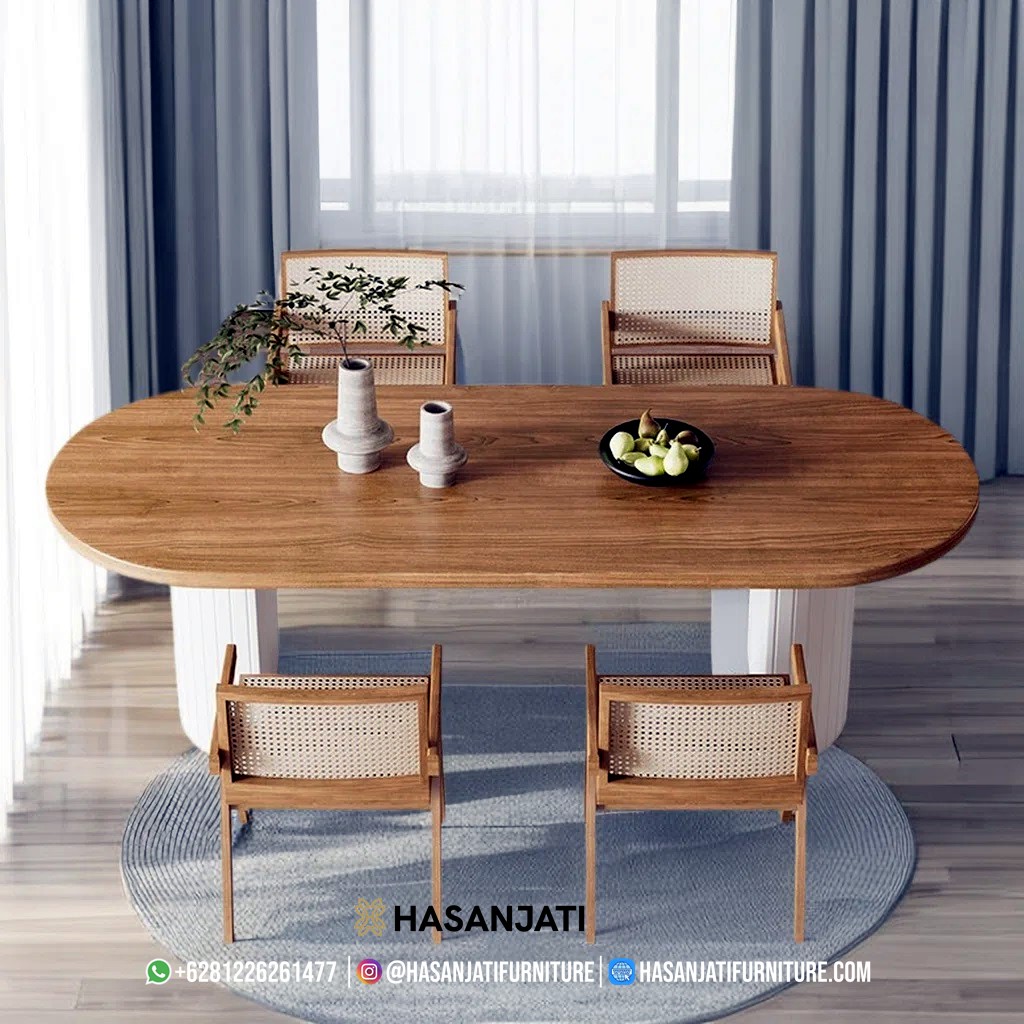Meja makan minimalis oval modern dengan sentuhan kayu alami dan kaki putih elegan dari Hasan Jati Furniture
